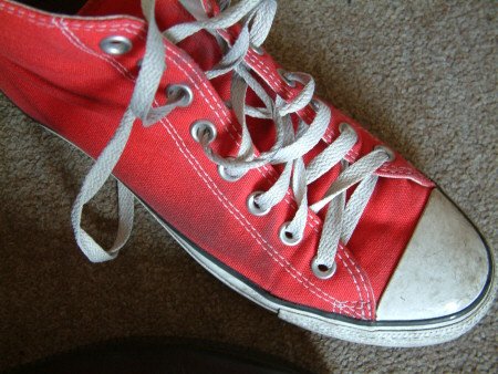 My red Converse trainer