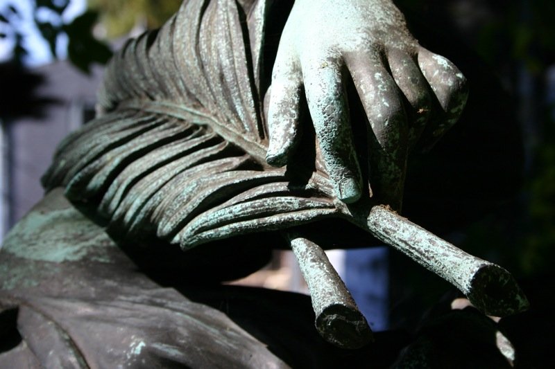 Holding a bronze leaf