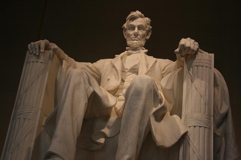 Lincoln, sitting