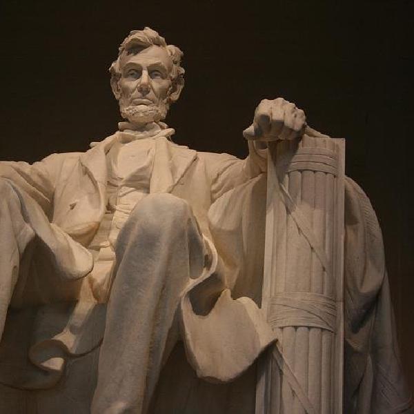 Lincoln, sitting