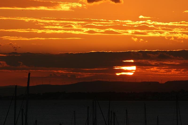 Sunset over wind turbines