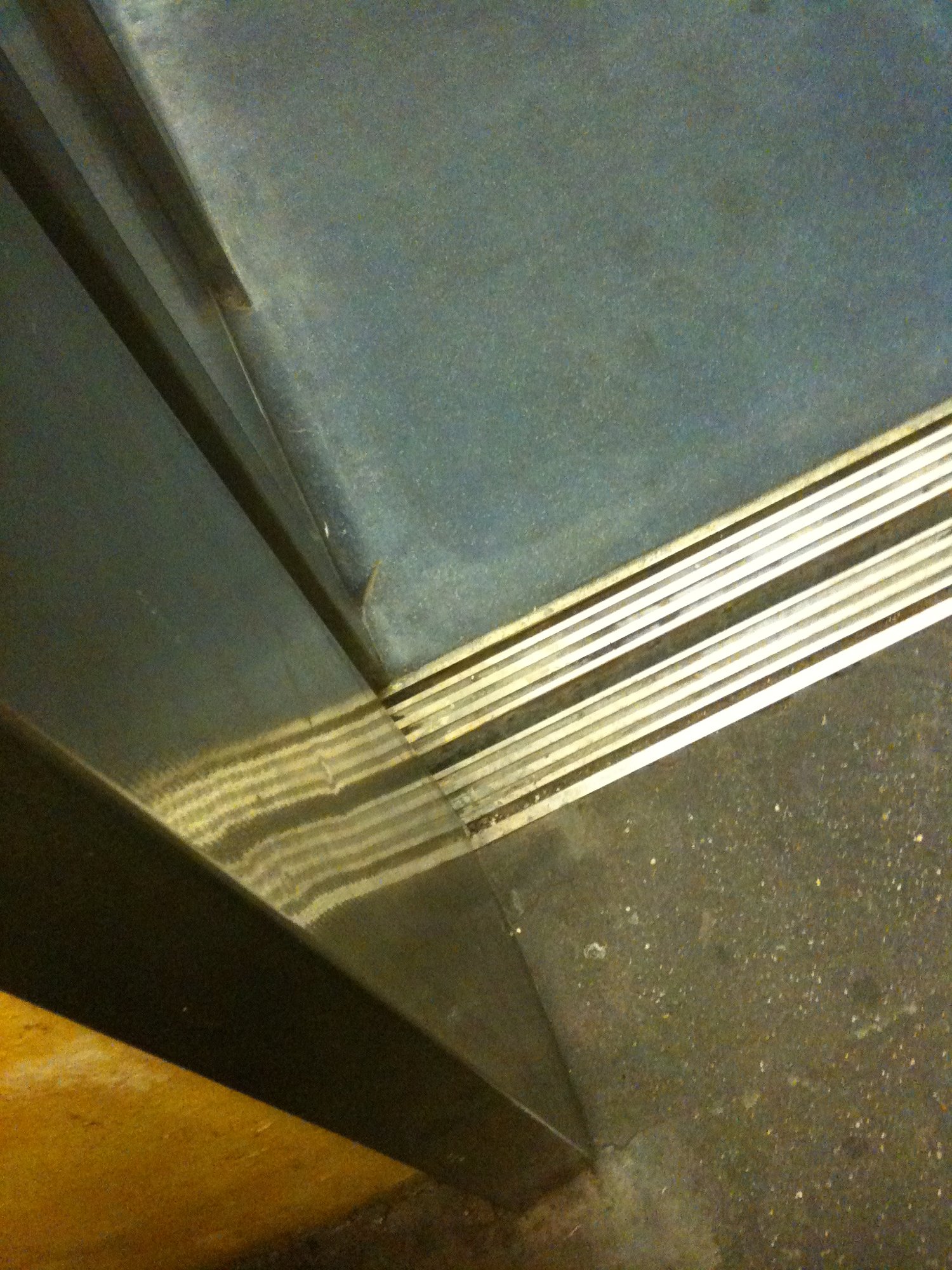 To a moving floor